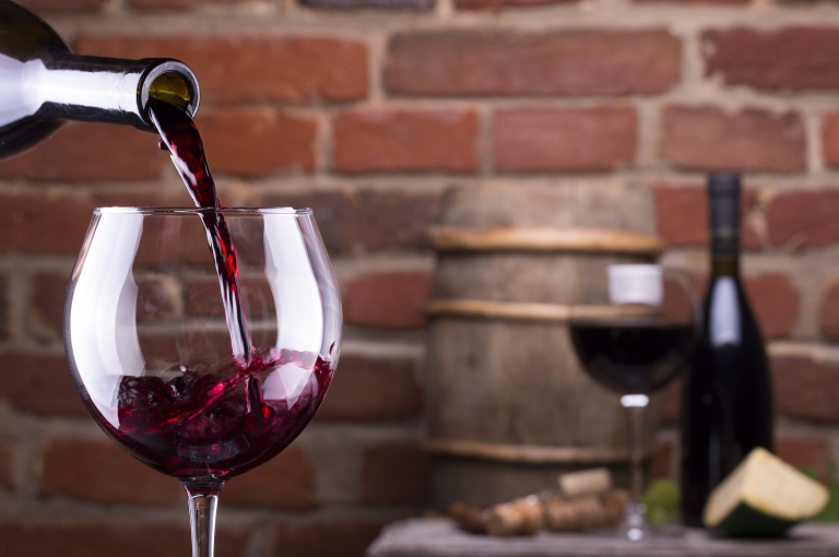 Wine-Glass-Of-Wine-Against-A-Brick-Wall.jpg