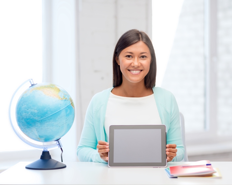 education and school, travel concept - female teacher with globe