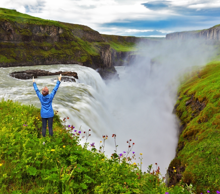 Iceland-Powerful-Gullfoss-in-Iceland-with-woman.jpg